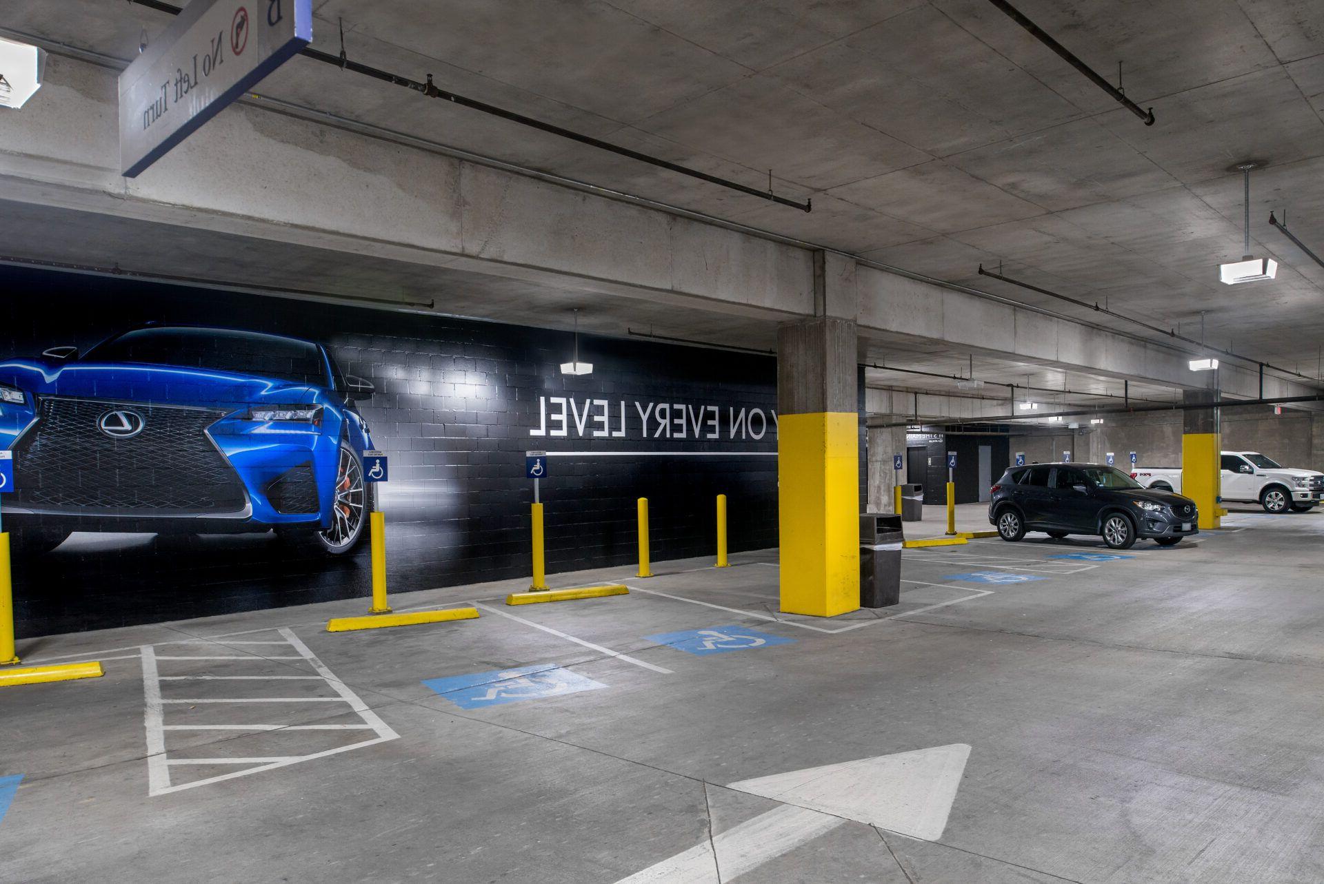 A parking structure well lit with LED parking garage lights